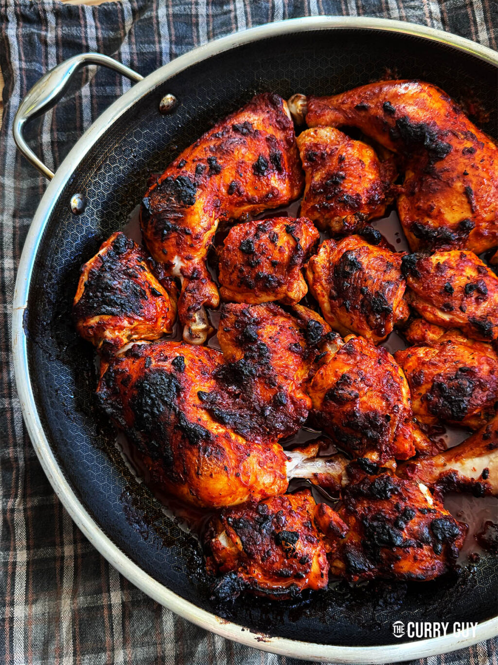 Harissa chicken in a pan
